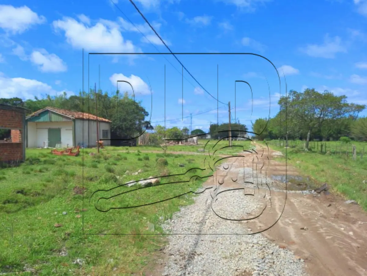 LOTE 001 - Terreno e Prédio em Pelotas